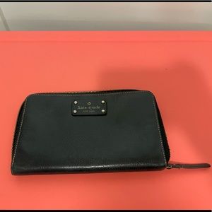 Kate Spade Women’s black travel wallet